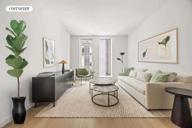 a living room with furniture flowerpot and window