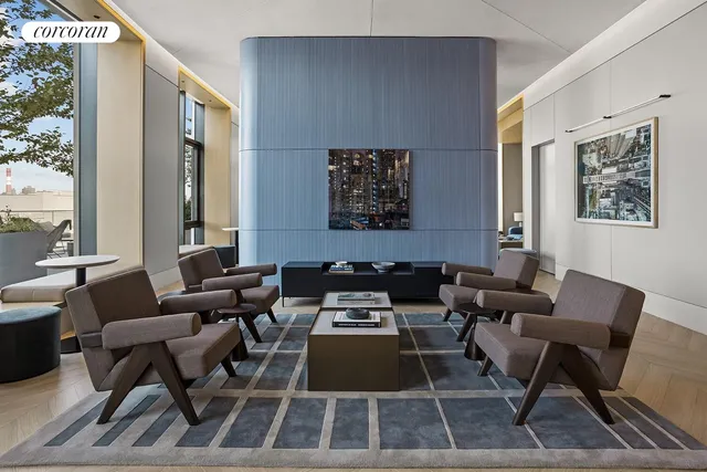 a balcony with table and chairs