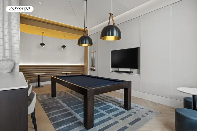 a living room with furniture and a rug