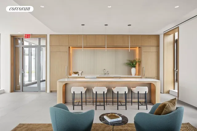 a view of a dinning tables and chairs in the balcony