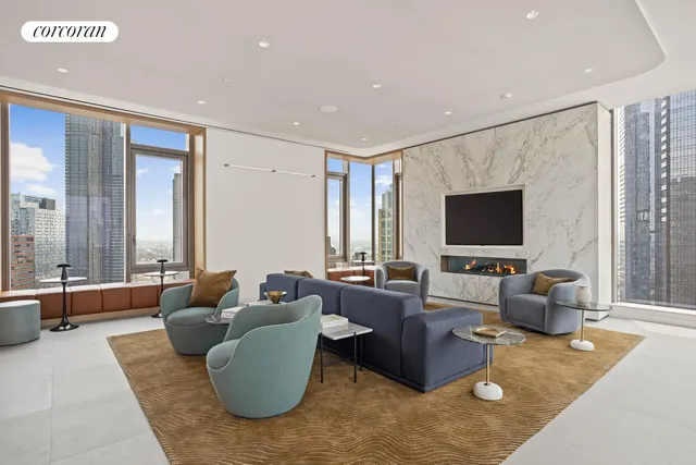 a living room with furniture a large window and white walls