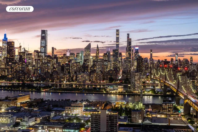 a living room with furniture and large windows