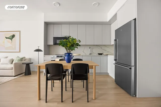 a view of a dining room with furniture