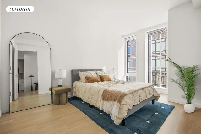 a kitchen with stainless steel appliances kitchen island granite countertop a refrigerator and a stove top oven