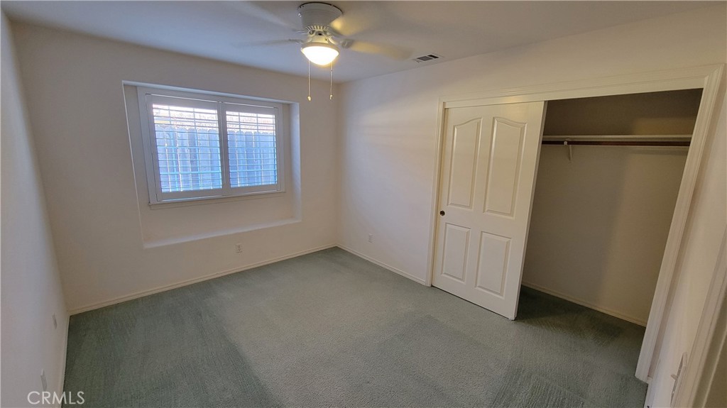 1115 Rose Court Grover Beach, CA 93433 - Photo 11 of 17 an empty room with windows and closet