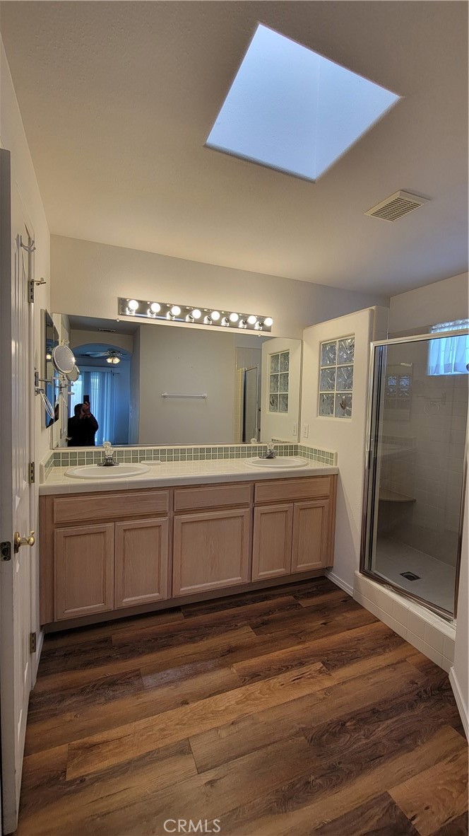 1115 Rose Court Grover Beach, CA 93433 - Photo 9 of 17 a kitchen with cabinets and wooden floor