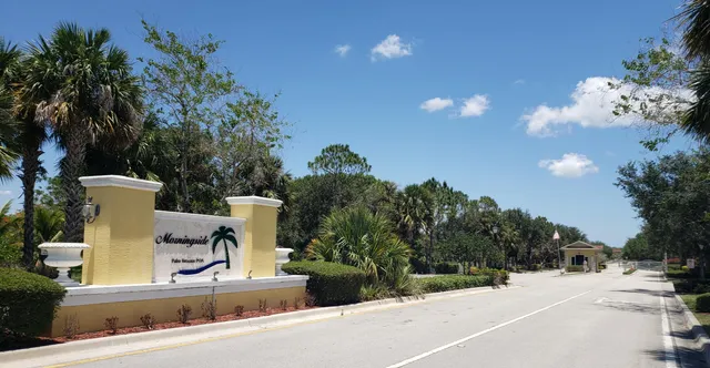 a view of a house with outdoor space and garden view