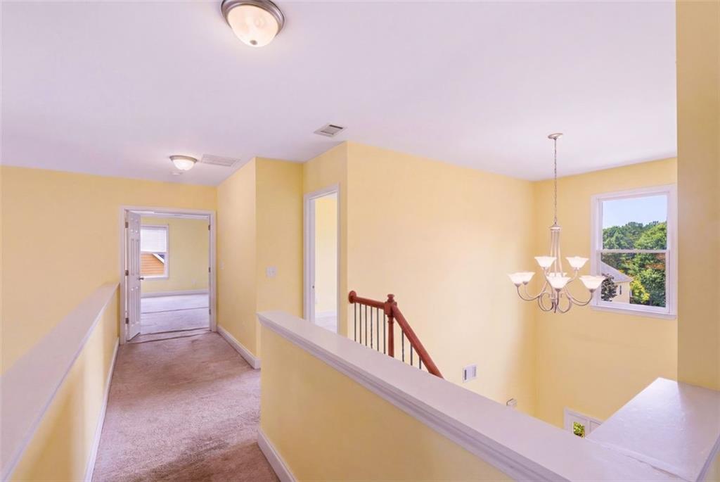 3420 Bulloch Lake Road Loganville, GA 30052 - Photo 30 of 57 a view of a living room with a balcony