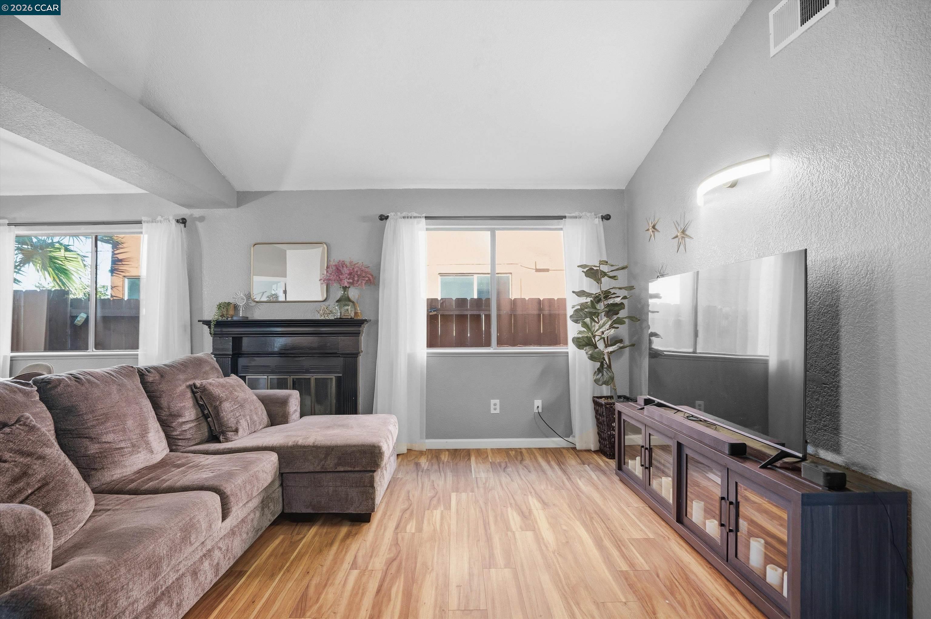 232 Case Drive Pittsburg, CA 94565 - Photo 12 of 37 a living room with furniture and a flat screen tv