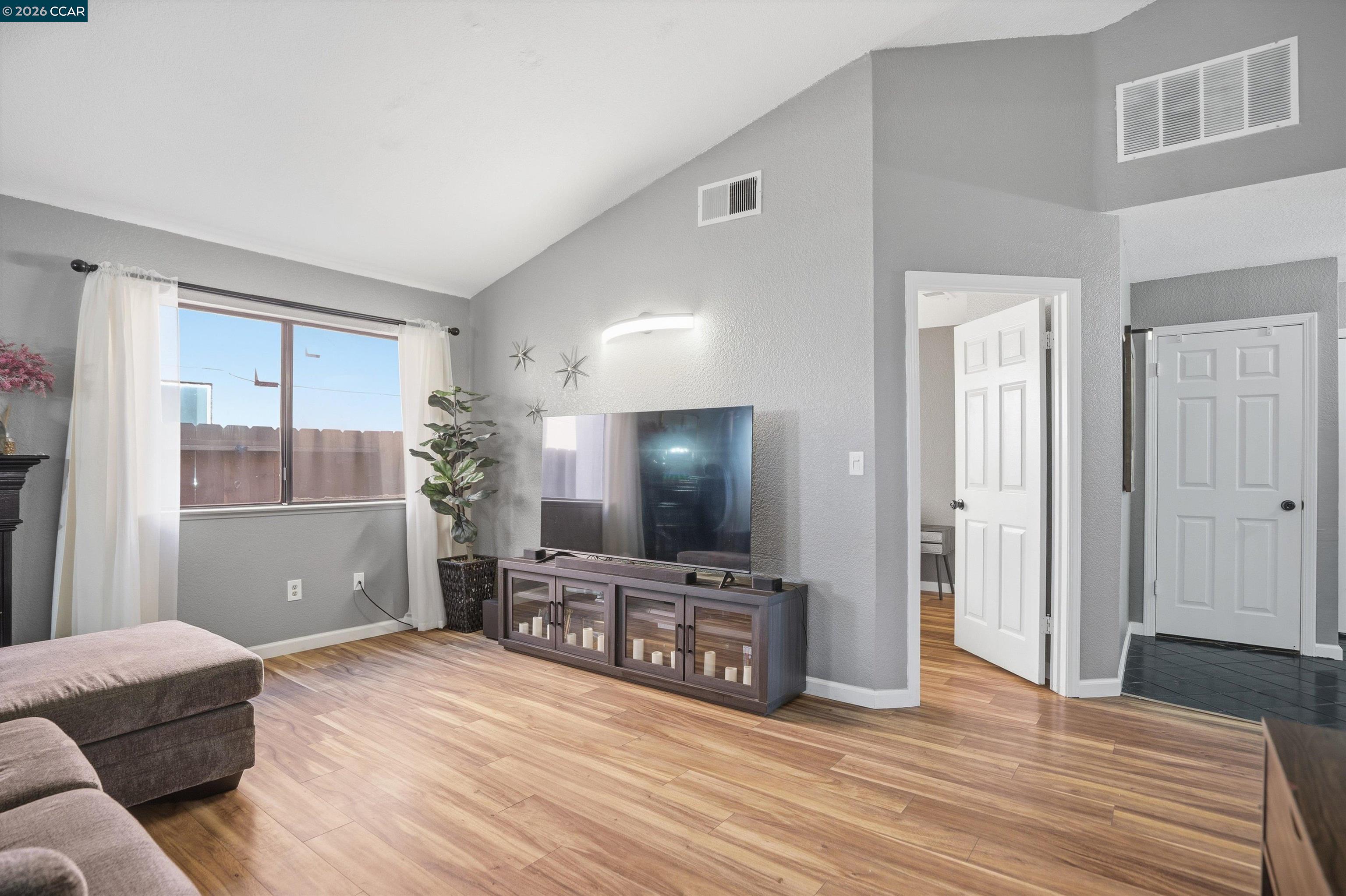 232 Case Drive Pittsburg, CA 94565 - Photo 13 of 37 a living room with furniture and a flat screen tv