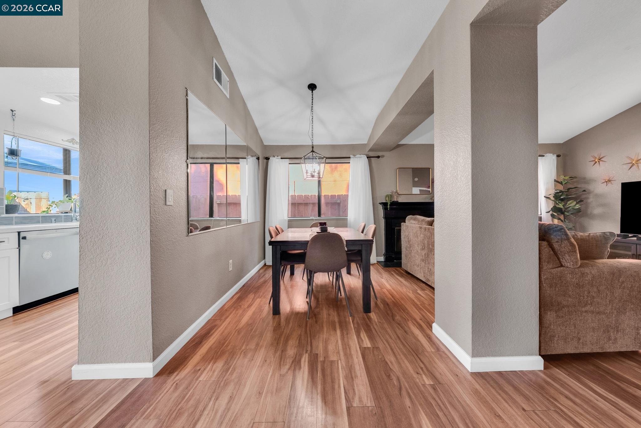 232 Case Drive Pittsburg, CA 94565 - Photo 15 of 37 a view of a dining room with furniture and wooden floor