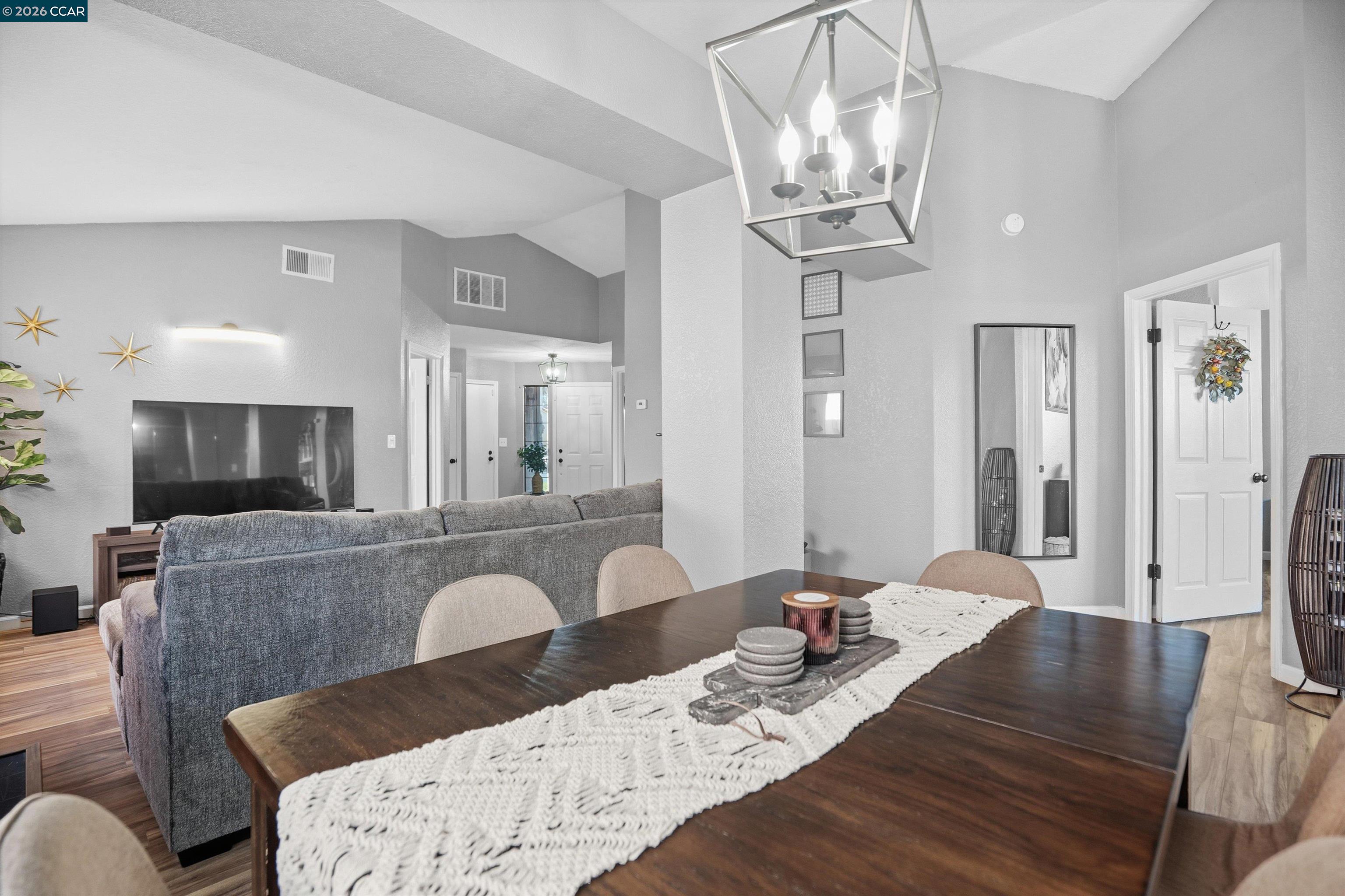 232 Case Drive Pittsburg, CA 94565 - Photo 16 of 37 a living room with furniture and a chandelier