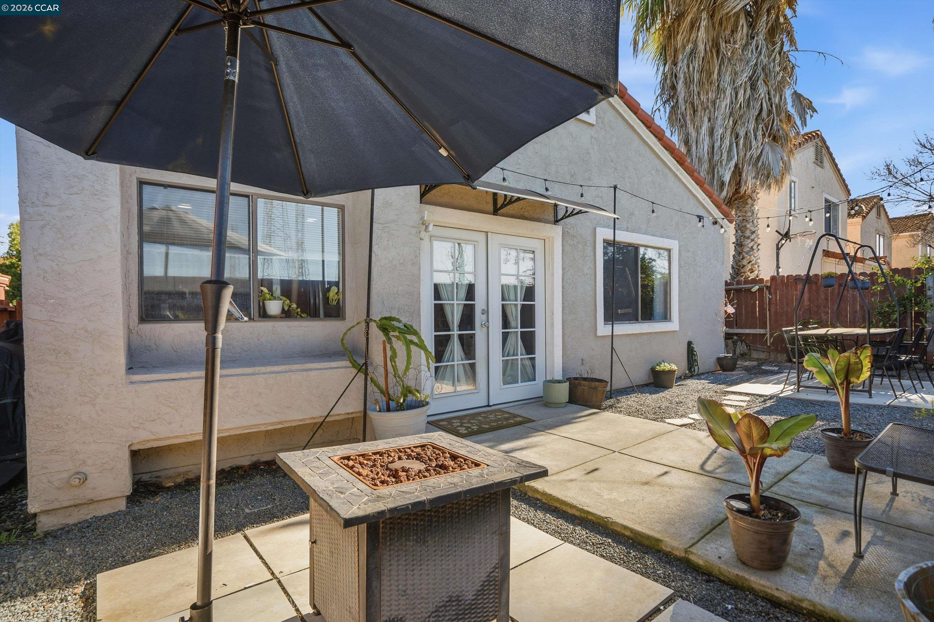 232 Case Drive Pittsburg, CA 94565 - Photo 31 of 37 a view of a dinning table and chairs in the patio