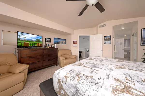 a bedroom with a bed and furniture