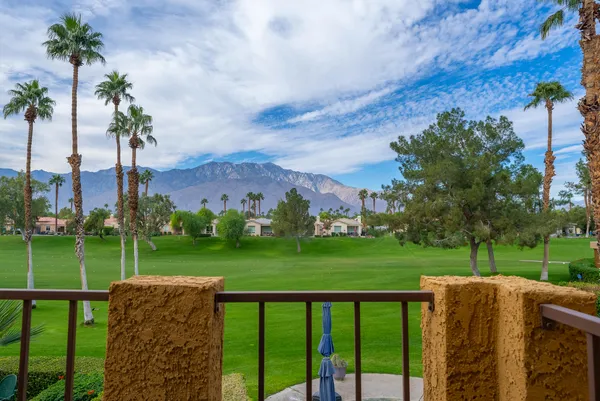 a view of a big yard next to a yard