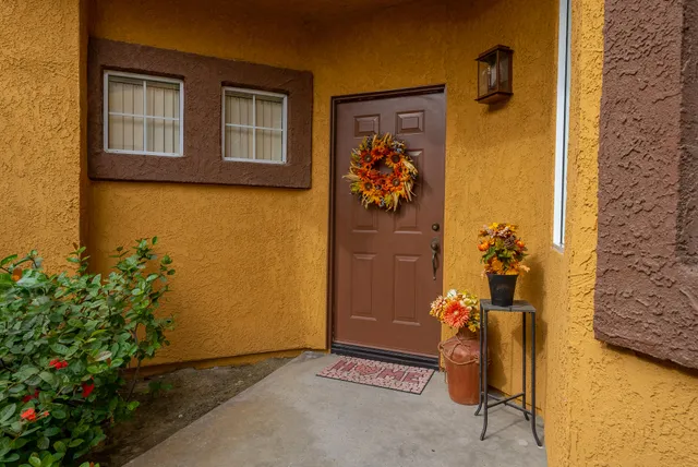 a view of a entryway with wooden floor