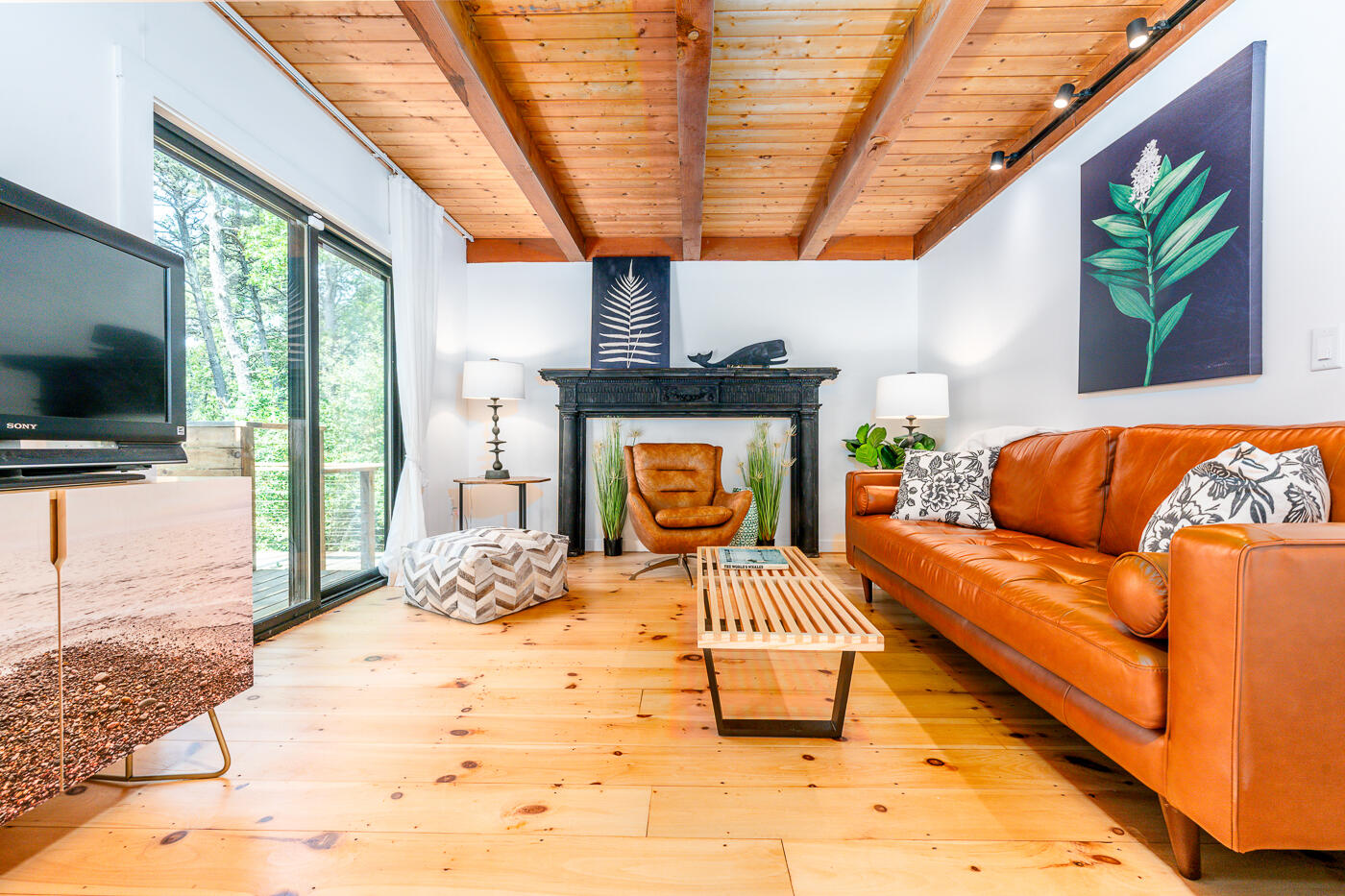 215 Gull Pond Road Wellfleet, MA 02667 - Photo 16 of 47 a outdoor living space with furniture and a flat screen tv