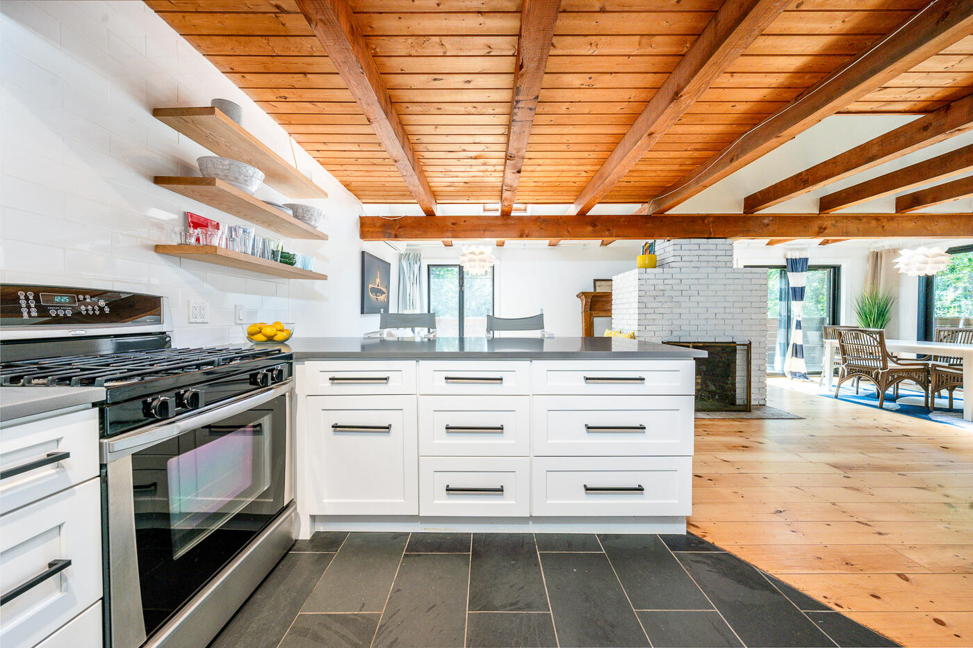 215 Gull Pond Road Wellfleet, MA 02667 - Photo 3 of 47 a kitchen with a stove and a sink