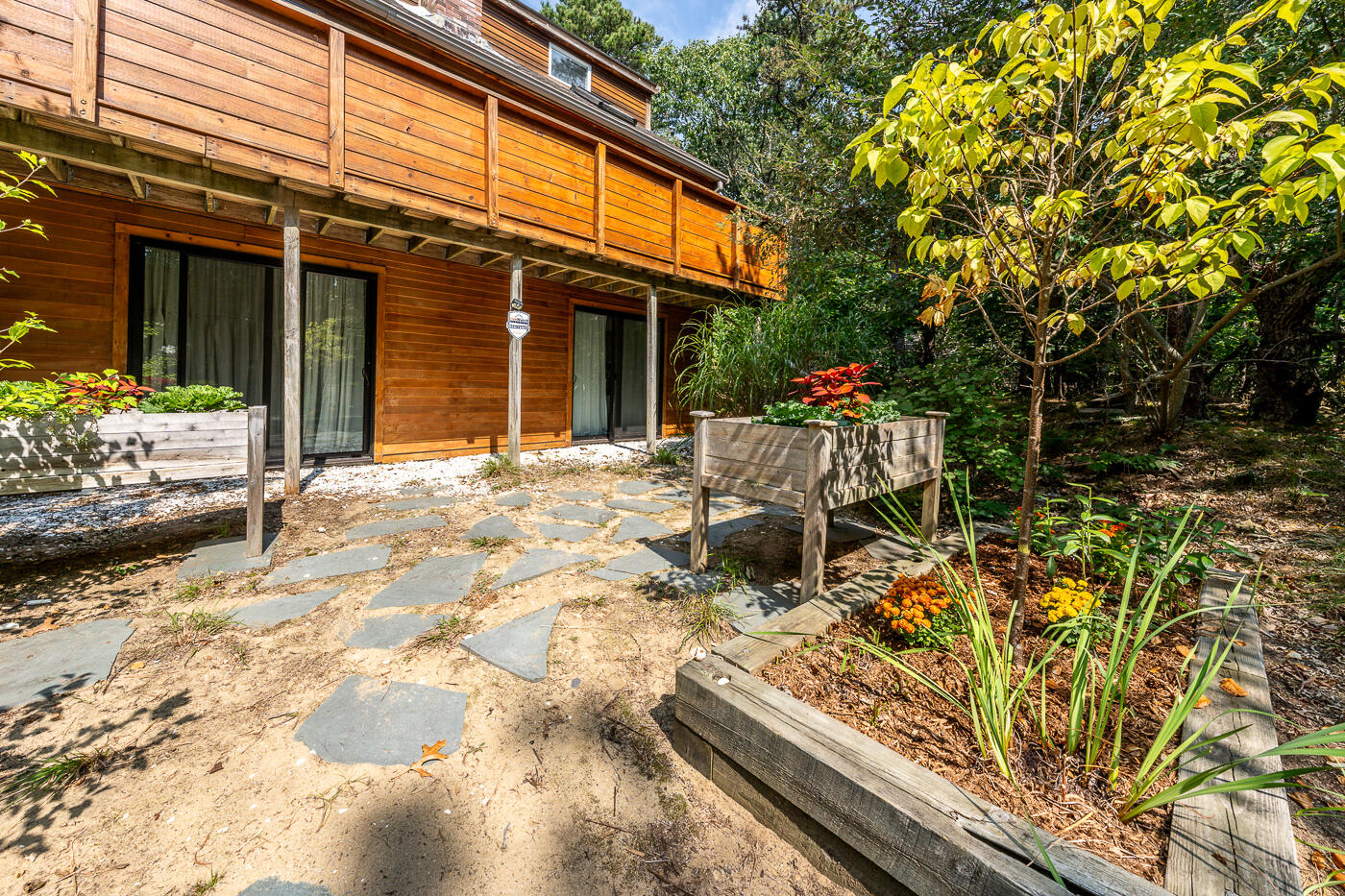 215 Gull Pond Road Wellfleet, MA 02667 - Photo 43 of 47 a view of a chairs and tables in the patio