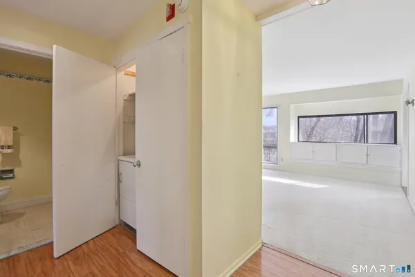 a view of bathroom with wooden floor