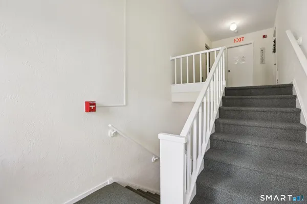 a view of a hallway with entryway