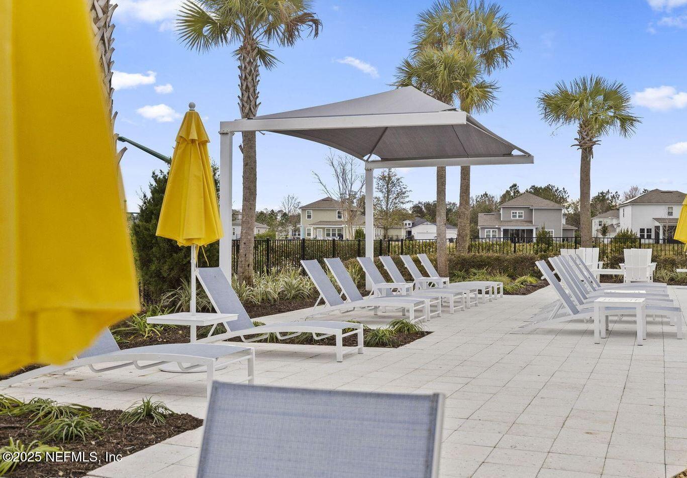 282 Hillendale Circle St. Johns, FL 32259 - Photo 20 of 29 a view of a swimming pool with a lounge chair