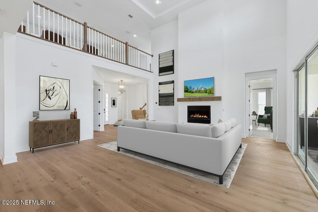 282 Hillendale Circle St. Johns, FL 32259 - Photo 4 of 29 a living room with furniture and a flat screen tv