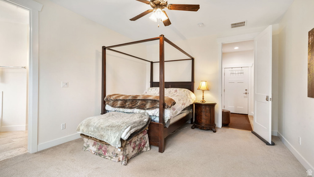 1238 Canyon View Road Midway, UT 84049 - Photo 19 of 36 Bedroom featuring light-colored carpeting, a ceiling fan with integrated lighting, and white trim