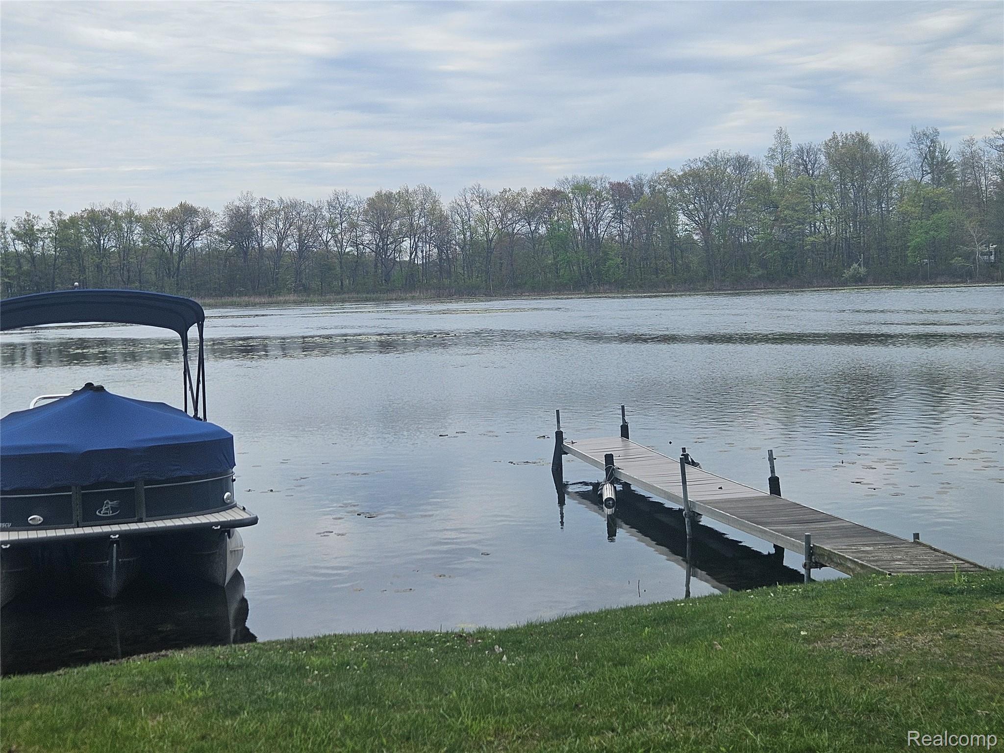 1210 Bay Ridge Drive Highland, MI 48356 - Photo 20 of 25 Dock featuring a water view