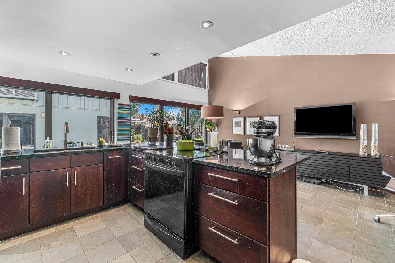3288 Northwest 27th Avenue Boca Raton, FL 33434 - Photo 11 of 32 Kitchen to Living Area
