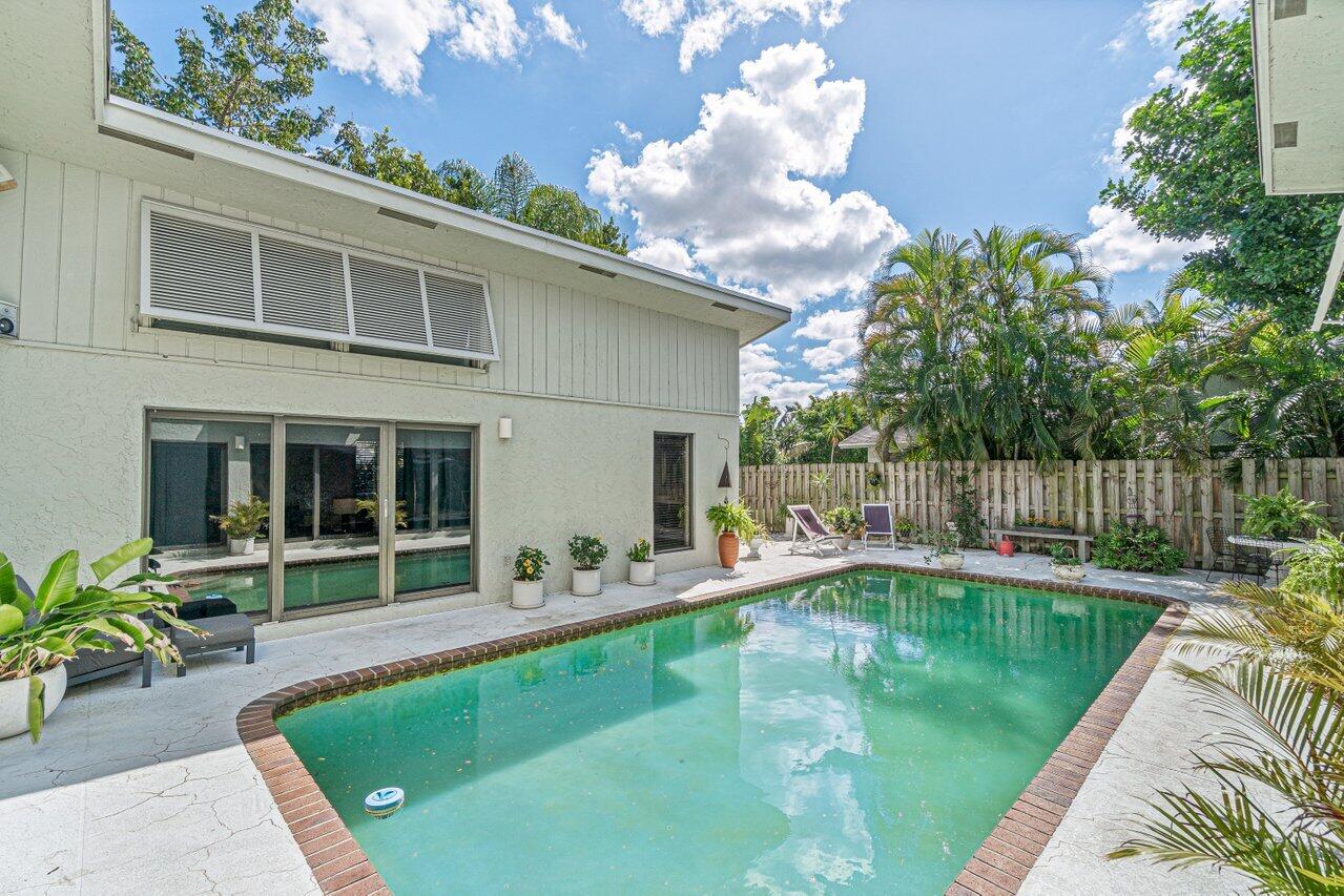 3288 Northwest 27th Avenue Boca Raton, FL 33434 - Photo 28 of 32 Courtyard Pool from Kitchen