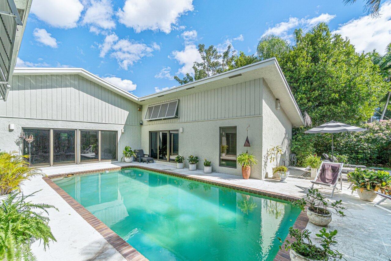3288 Northwest 27th Avenue Boca Raton, FL 33434 - Photo 29 of 32 Pool View from Living Space