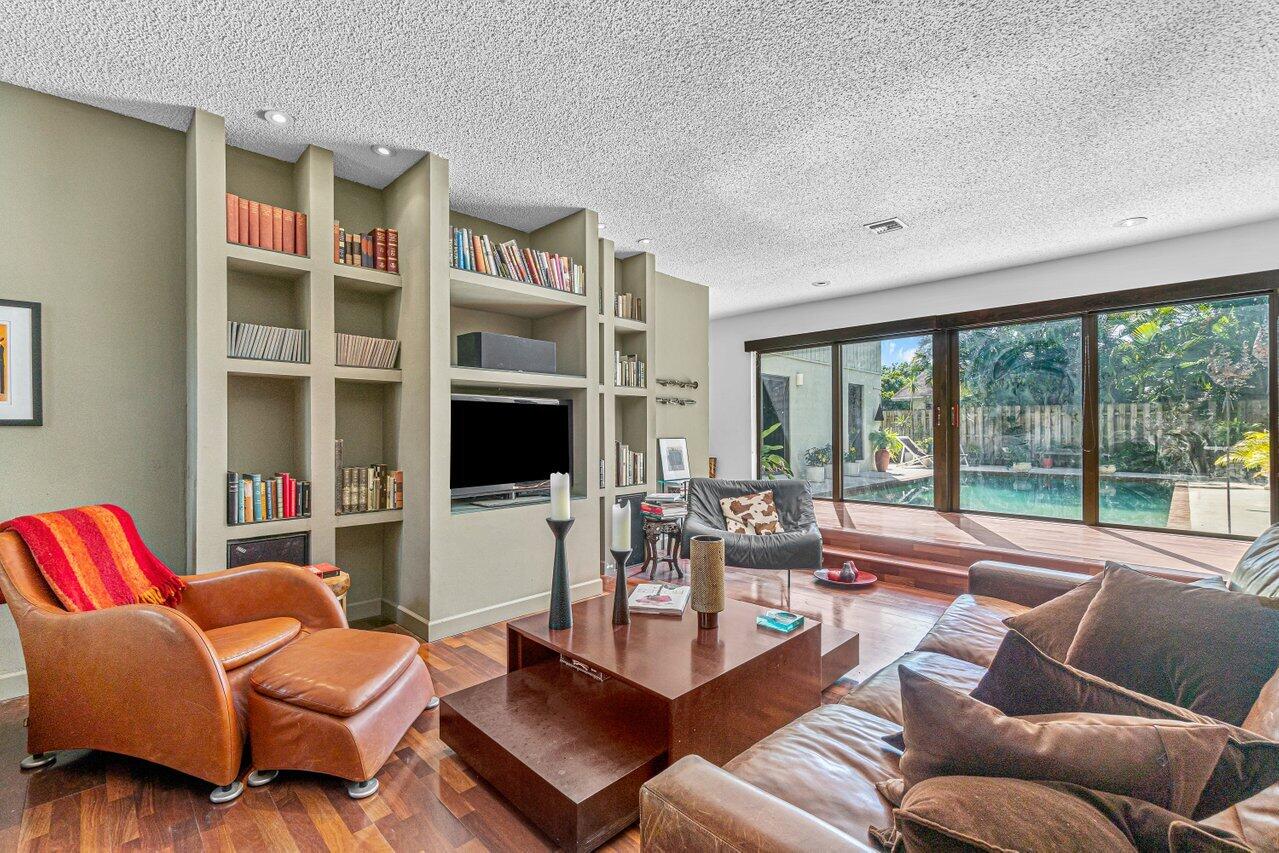 3288 Northwest 27th Avenue Boca Raton, FL 33434 - Photo 7 of 32 Den with pool view