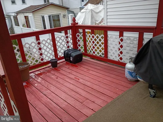 a view of a chairs and deck in the balcony
