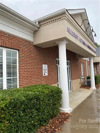 a view of a house with a garage