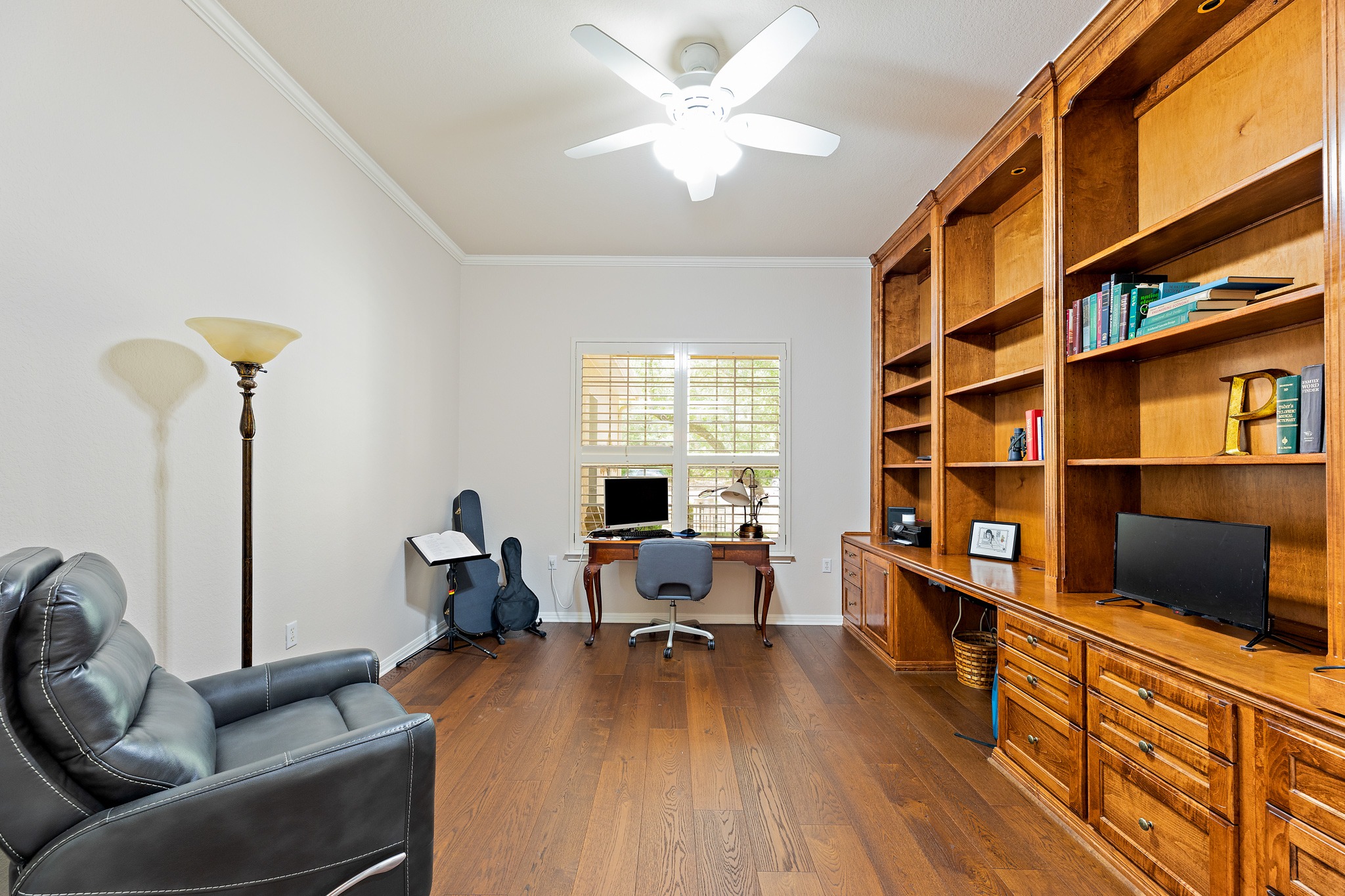 106 Wild Turkey Lane Georgetown, TX 78633 - Photo 21 of 39 a living room with furniture and a wooden floor