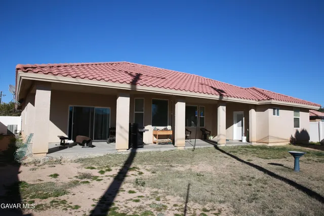 a view of a house with patio