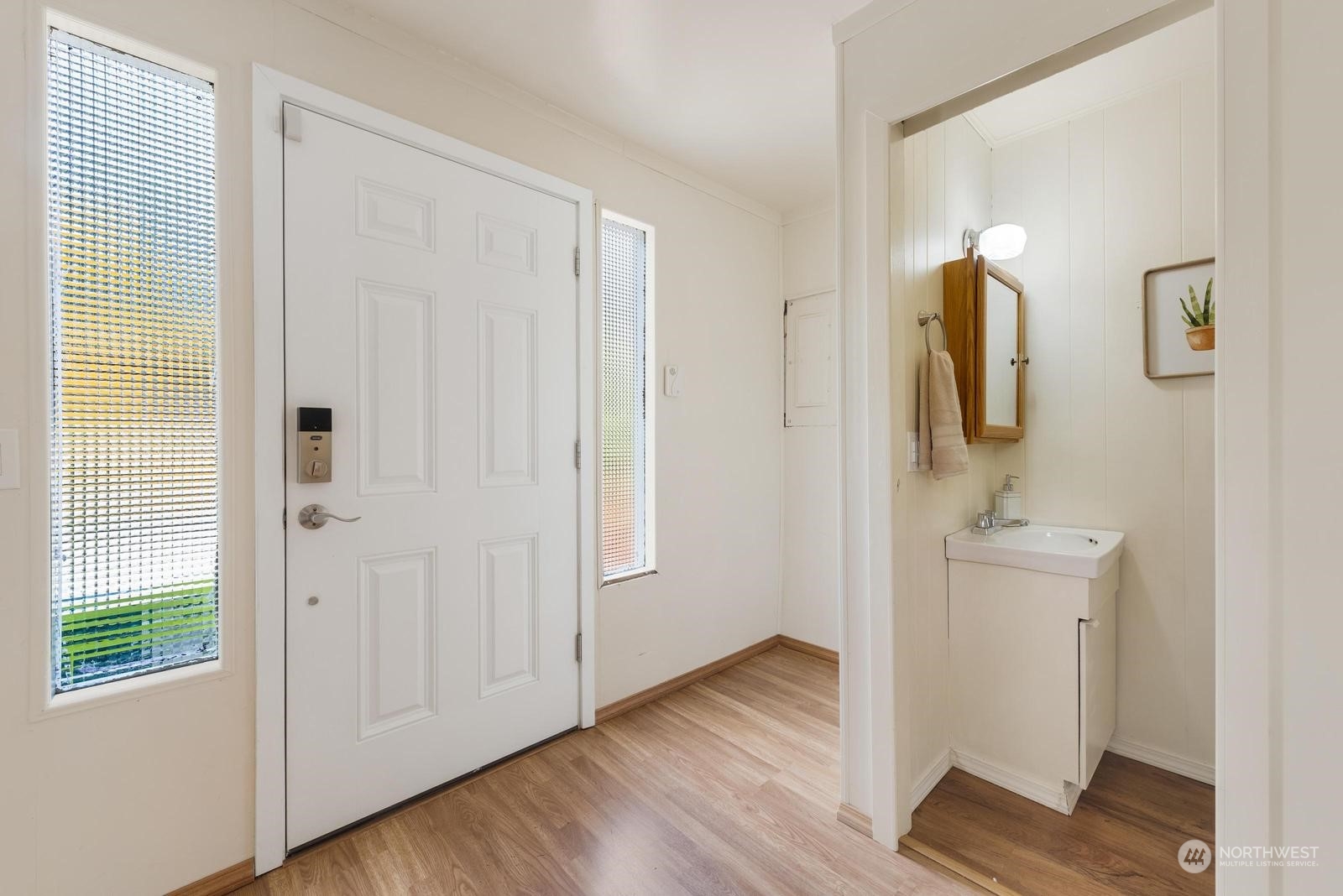 4531 Crescent Avenue Everett, WA 98203 - Photo 15 of 23 a bathroom with a sink and mirror