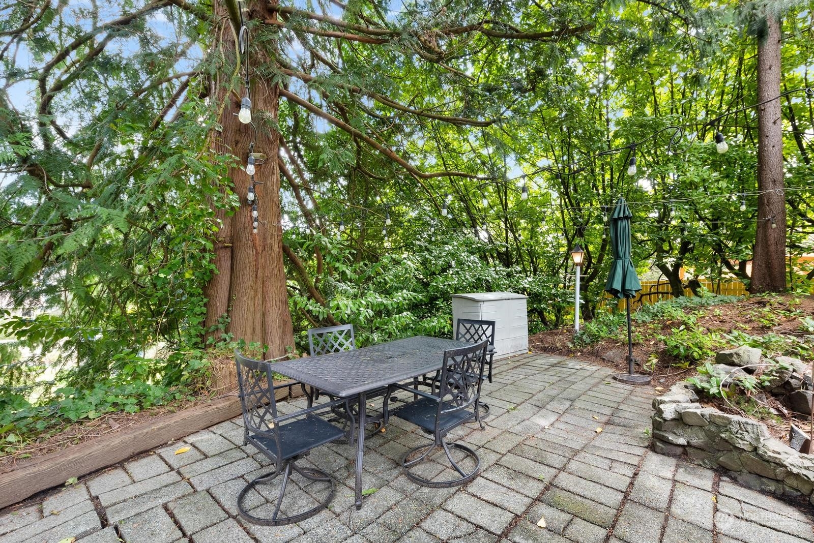 4531 Crescent Avenue Everett, WA 98203 - Photo 19 of 23 a view of a chairs and table in backyard