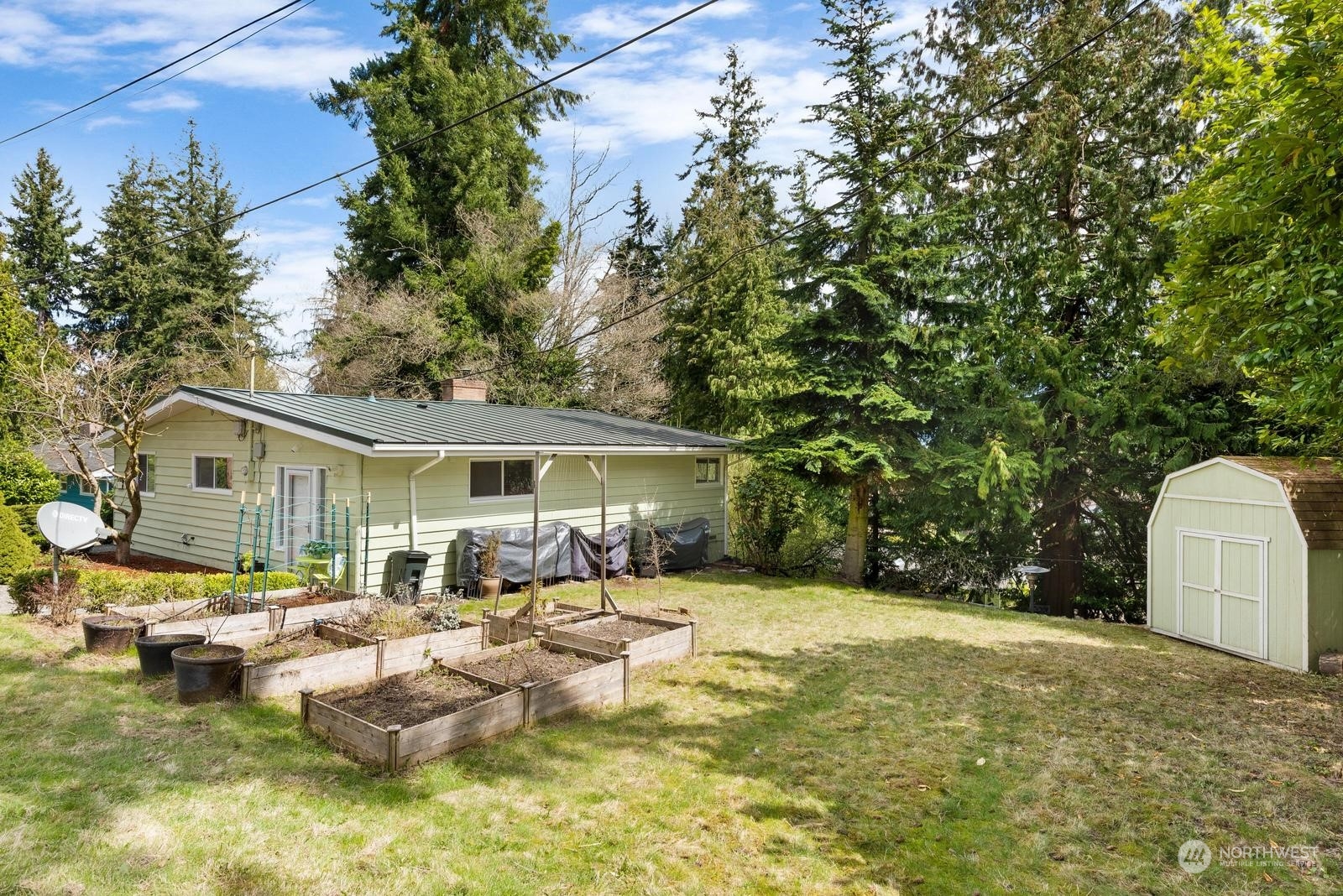 4531 Crescent Avenue Everett, WA 98203 - Photo 21 of 23 a view of a house with backyard and sitting area