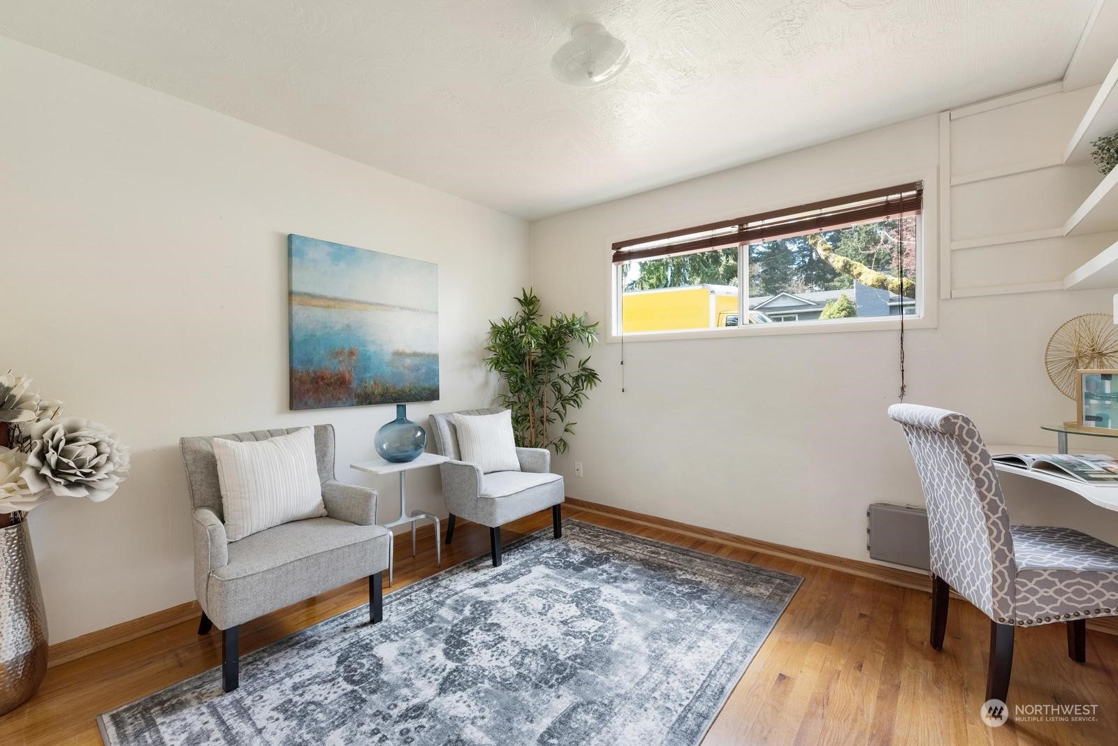 4531 Crescent Avenue Everett, WA 98203 - Photo 10 of 23 a living room with furniture and a wooden floor