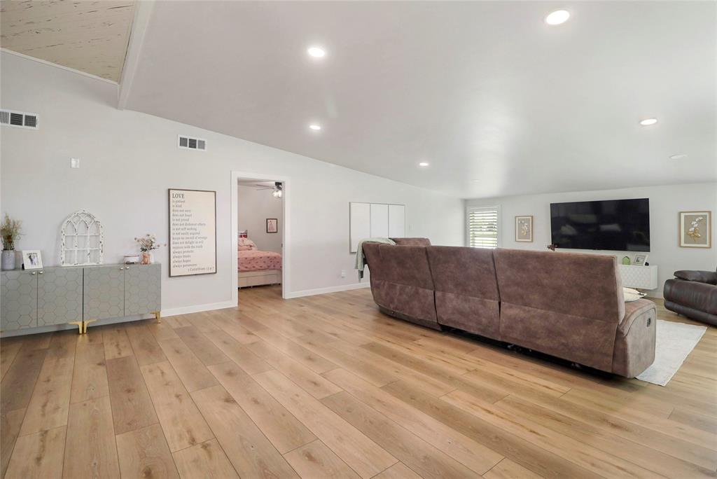 2408 Strader Road DISH, TX 76247 - Photo 11 of 40 a living room with furniture and a flat screen tv