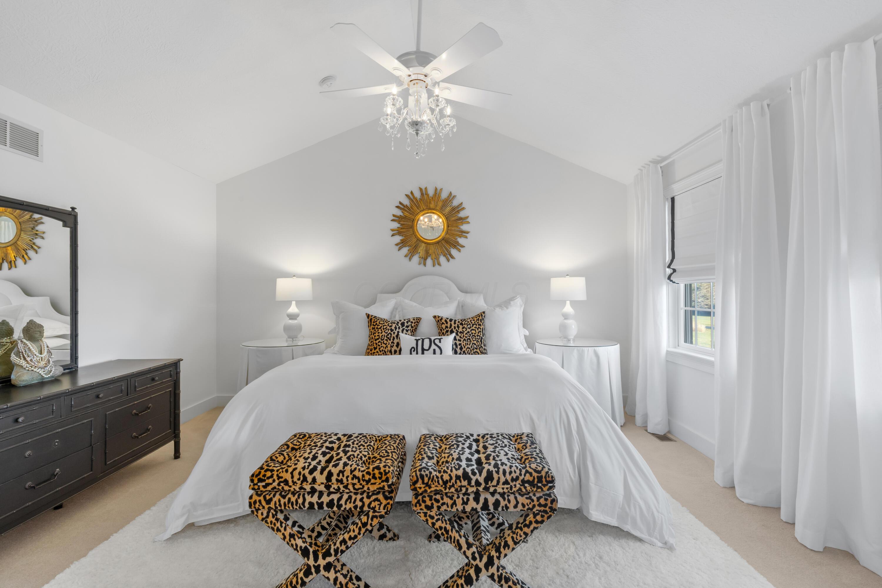 1364 Dale Ford Road Delaware, OH 43015 - Photo 47 of 112 • Light sand carpet • White painted wall • Lighted ceiling fan • Cathedral ceiling • Shades remain • Drapes remain