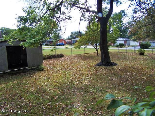 4604 Dover Road Louisville, KY 40216 - Photo 7 of 37 Fully Fenced Back Yard showing 1st Utility Shed.