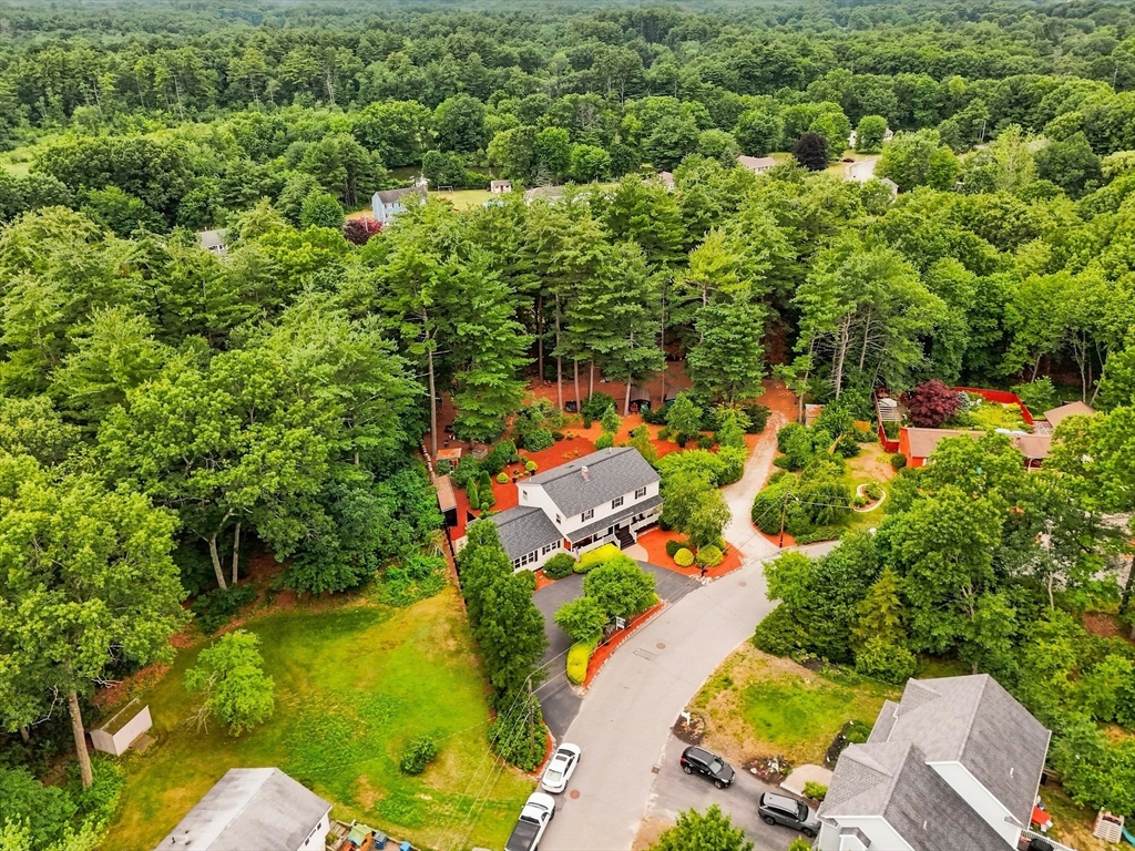 90 Rounsevell Road Tewksbury, MA 01876 - Photo 37 of 42 an aerial view of residential houses with outdoor space and trees all around