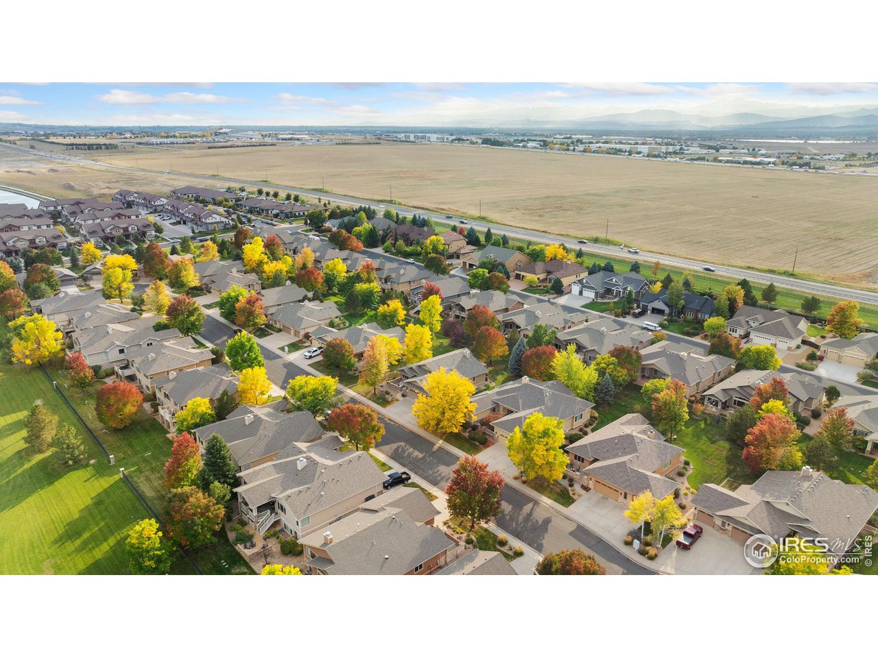 6511 Half Moon Bay Drive Windsor, CO 80550 - Photo 23 of 31 a view of an ocean and beach