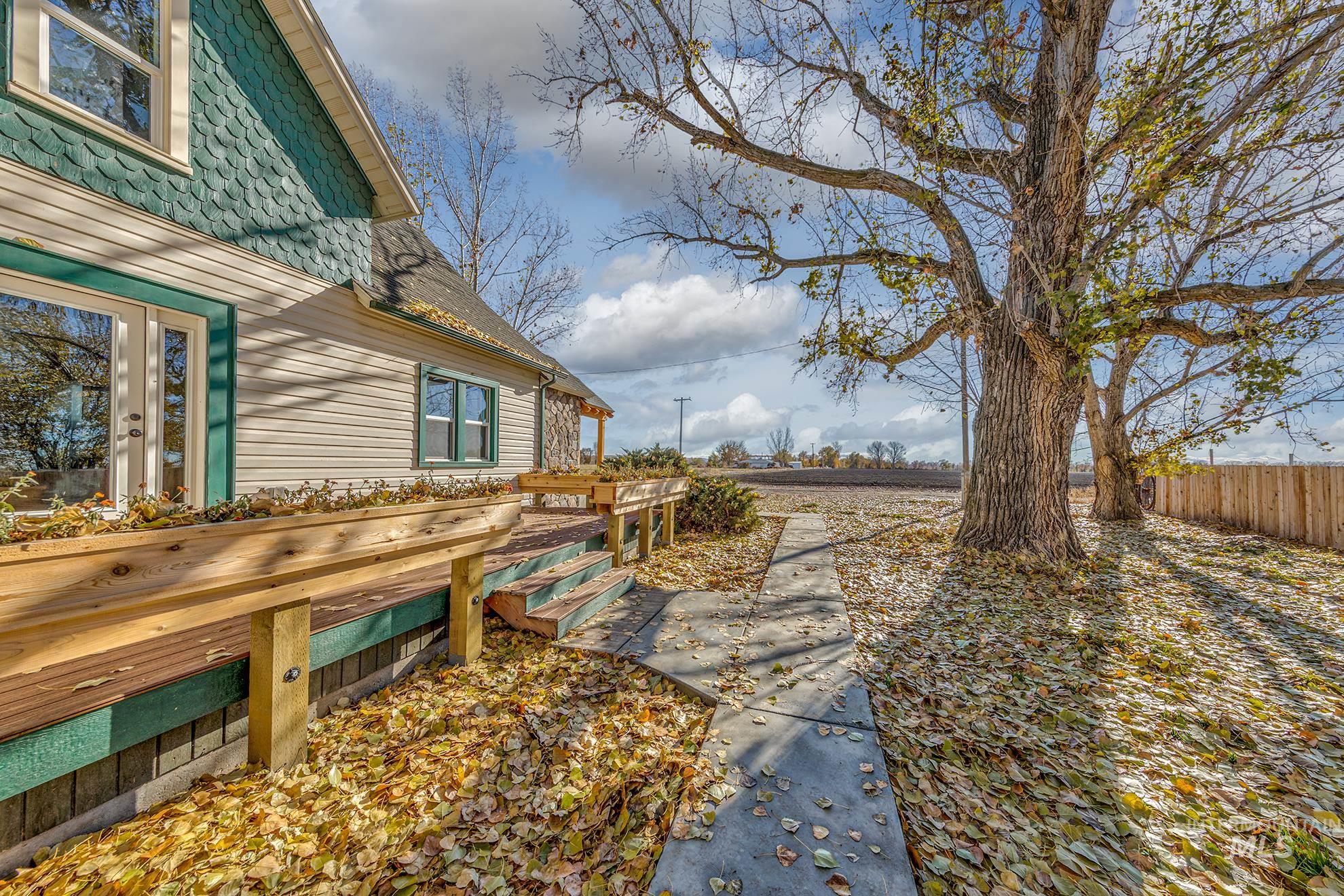 327 Macomb Road Weiser, ID 83672 - Photo 35 of 49 View of yard with a wooden deck