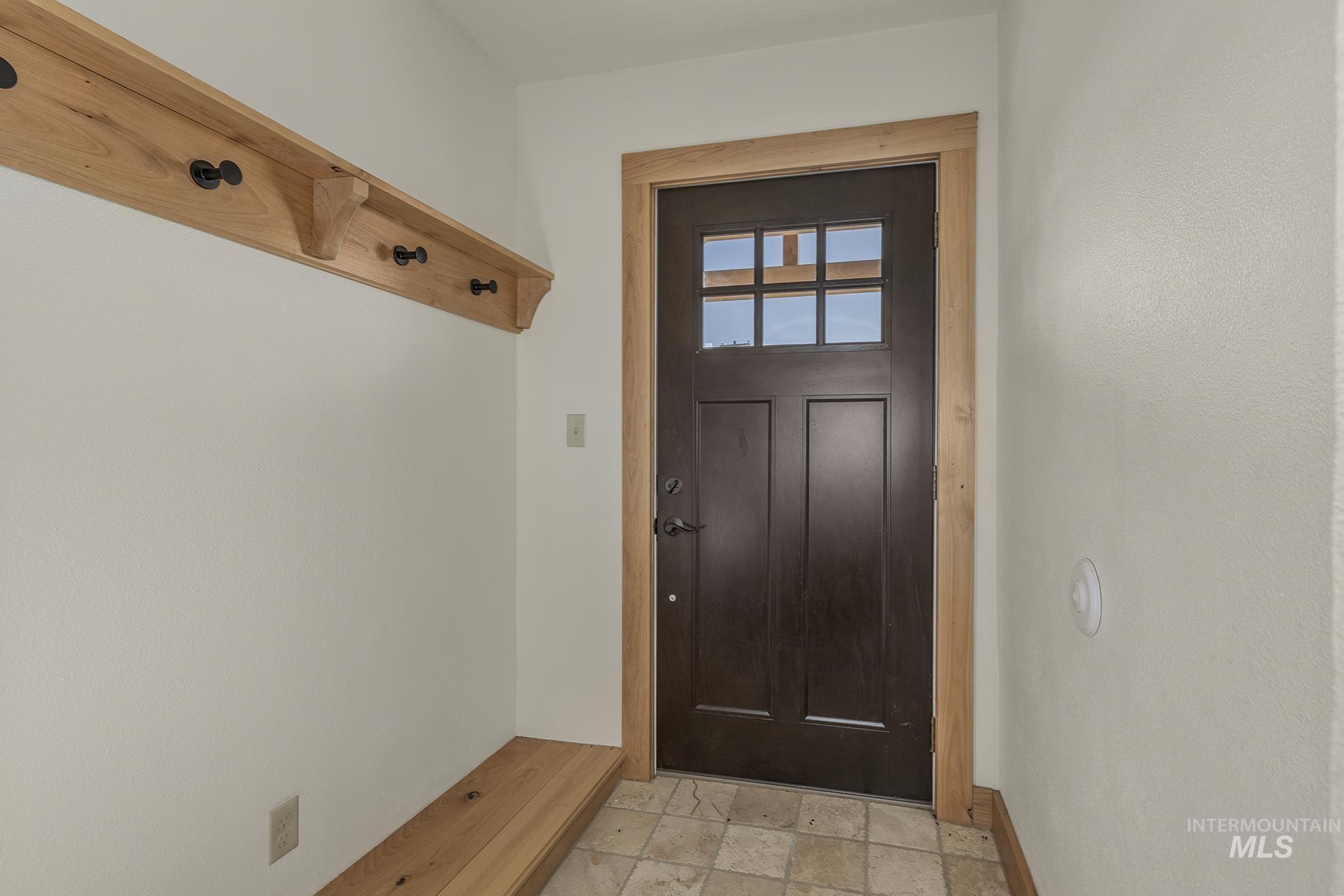 327 Macomb Road Weiser, ID 83672 - Photo 5 of 49 Entryway featuring stone finish flooring