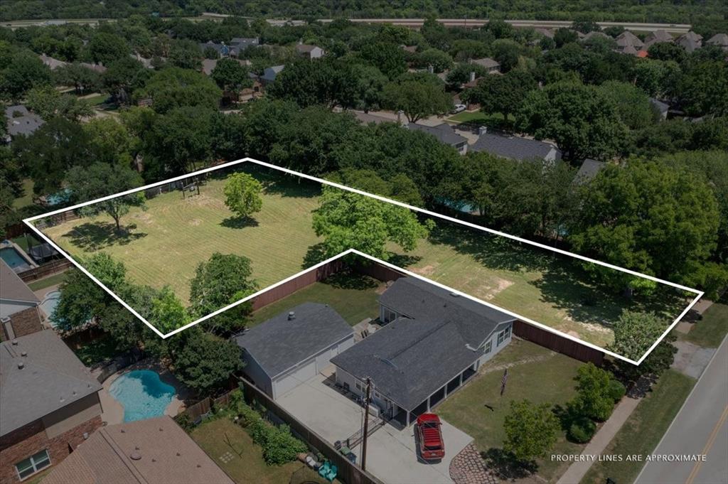 1000 Hughes Road Grapevine, TX 76051 - Photo 2 of 15 an aerial view of a house