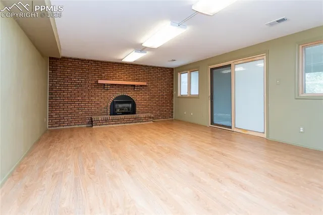 a living room with a wooden floor